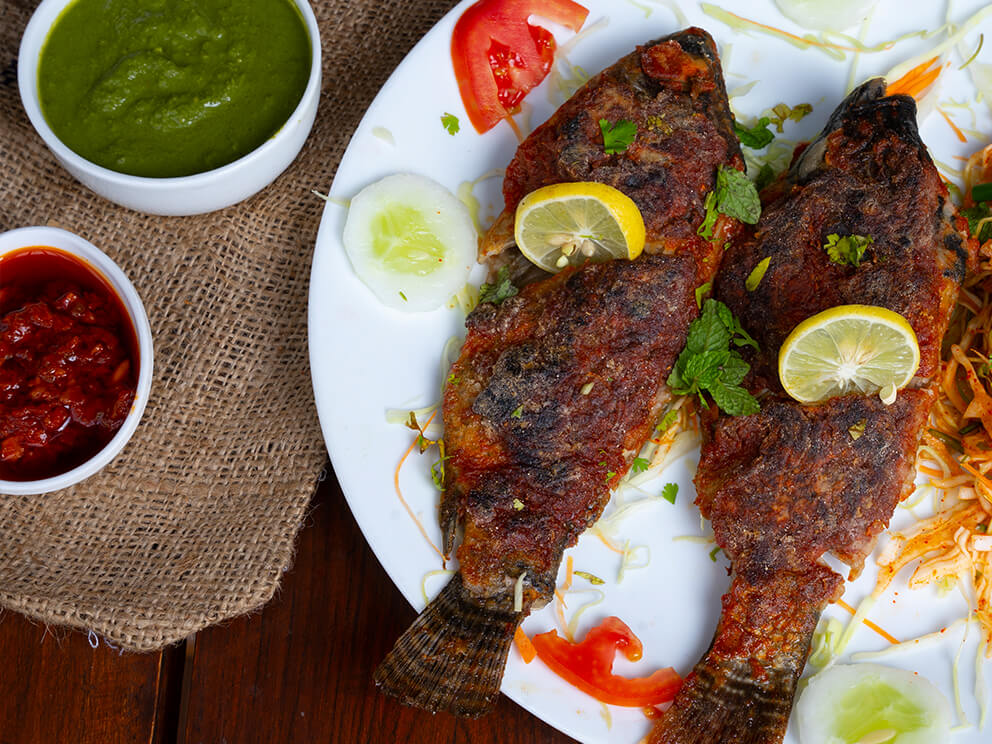 Plate filled with fried fish