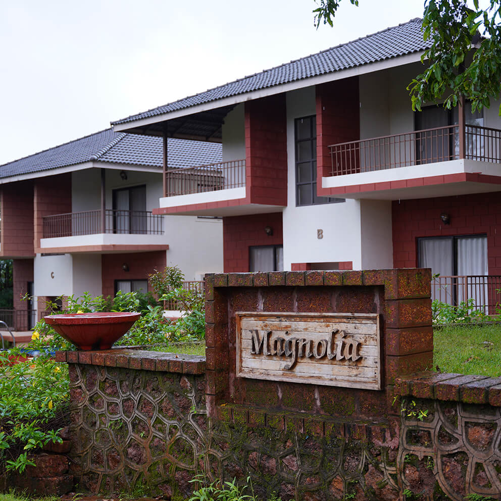 Resort sign on a brick wall